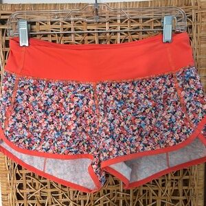 Lululemon Athletica Orange Athletic Shorts with Vibrant Design